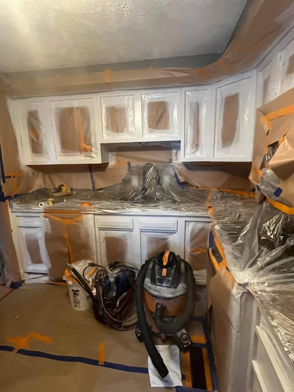 Kitchen cabinets freshly sprayed white